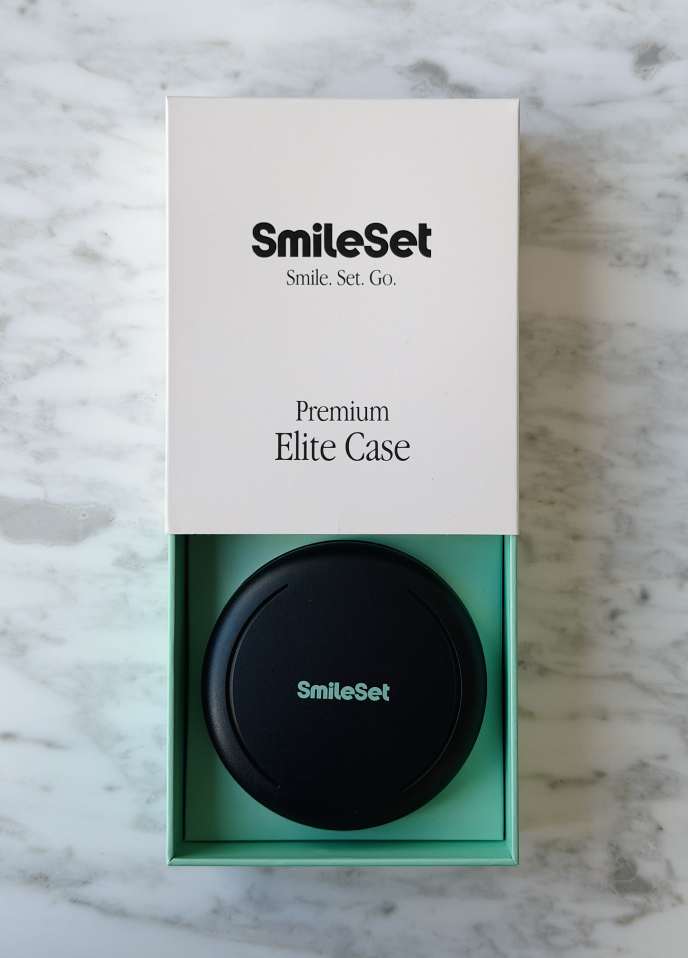 SmileSet Elite Case box shot from above on marble